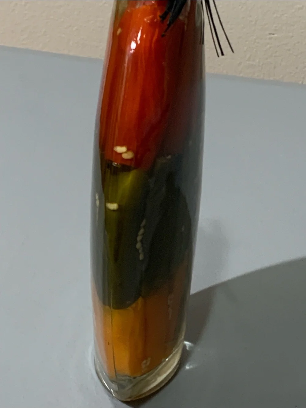 Glass Accent Bottle with Red, Green, Orange Peppers and White Beans